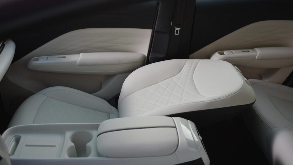 White leather front seat of the ARCFOX T1 electric SUV in the lie-flat position