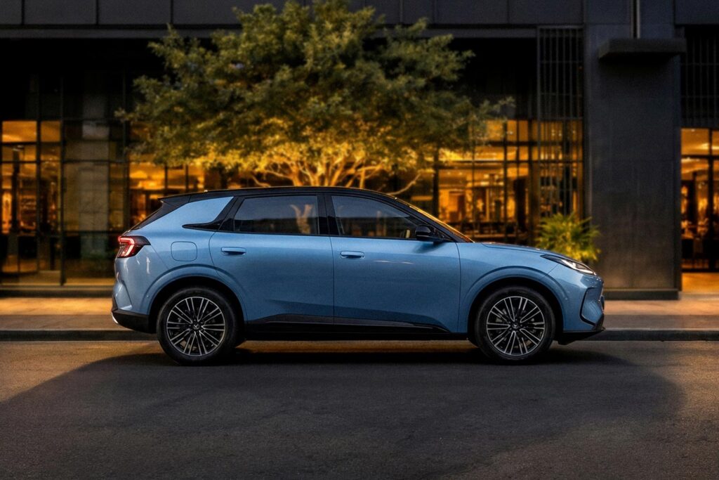 Side view of a blue ARCFOX T1 electric SUV parked on an Auckland street